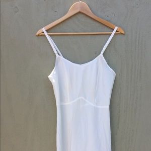 Vintage - The Snip-it, thin strapped, beige slip.
